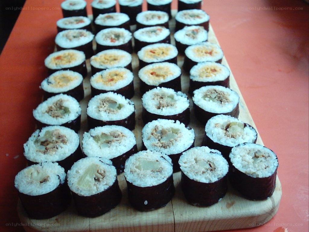sushi rolls on a cutting board