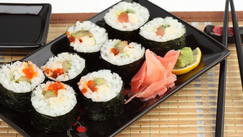 Sushi Rolls on Black Plate — Calm