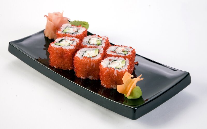 Sushi Rolls on Black Plate
