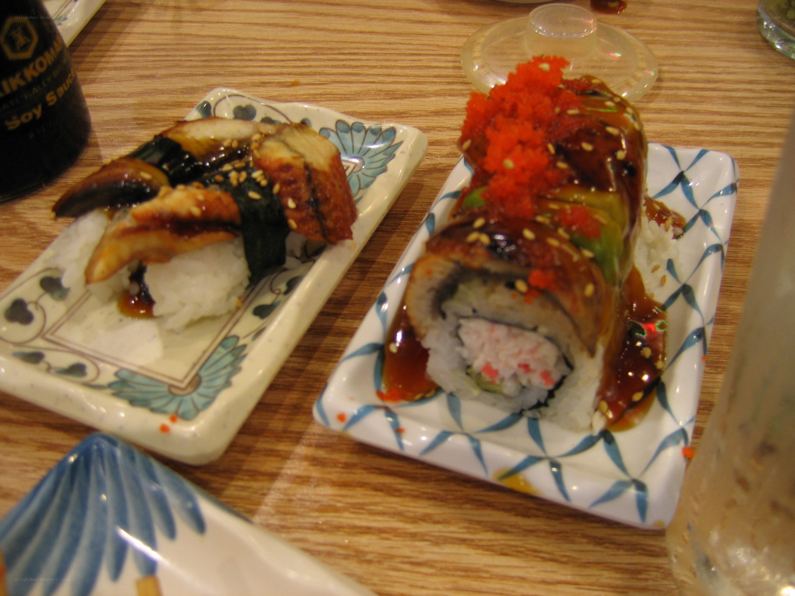 Sushi rolls on decorative plates