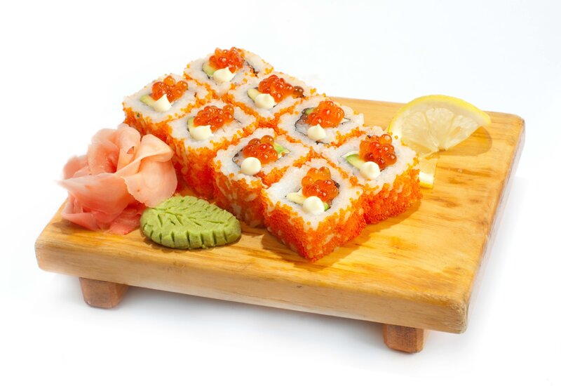 sushi rolls with garnishes