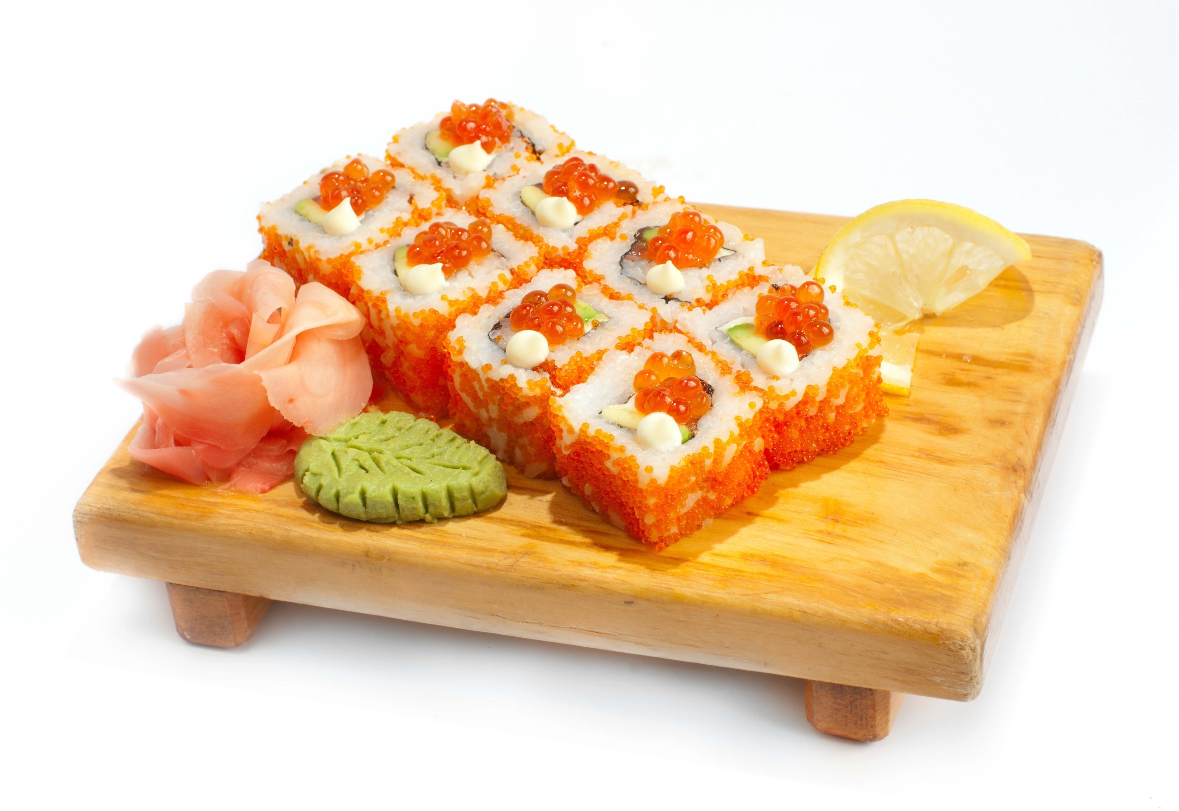 sushi rolls with garnishes