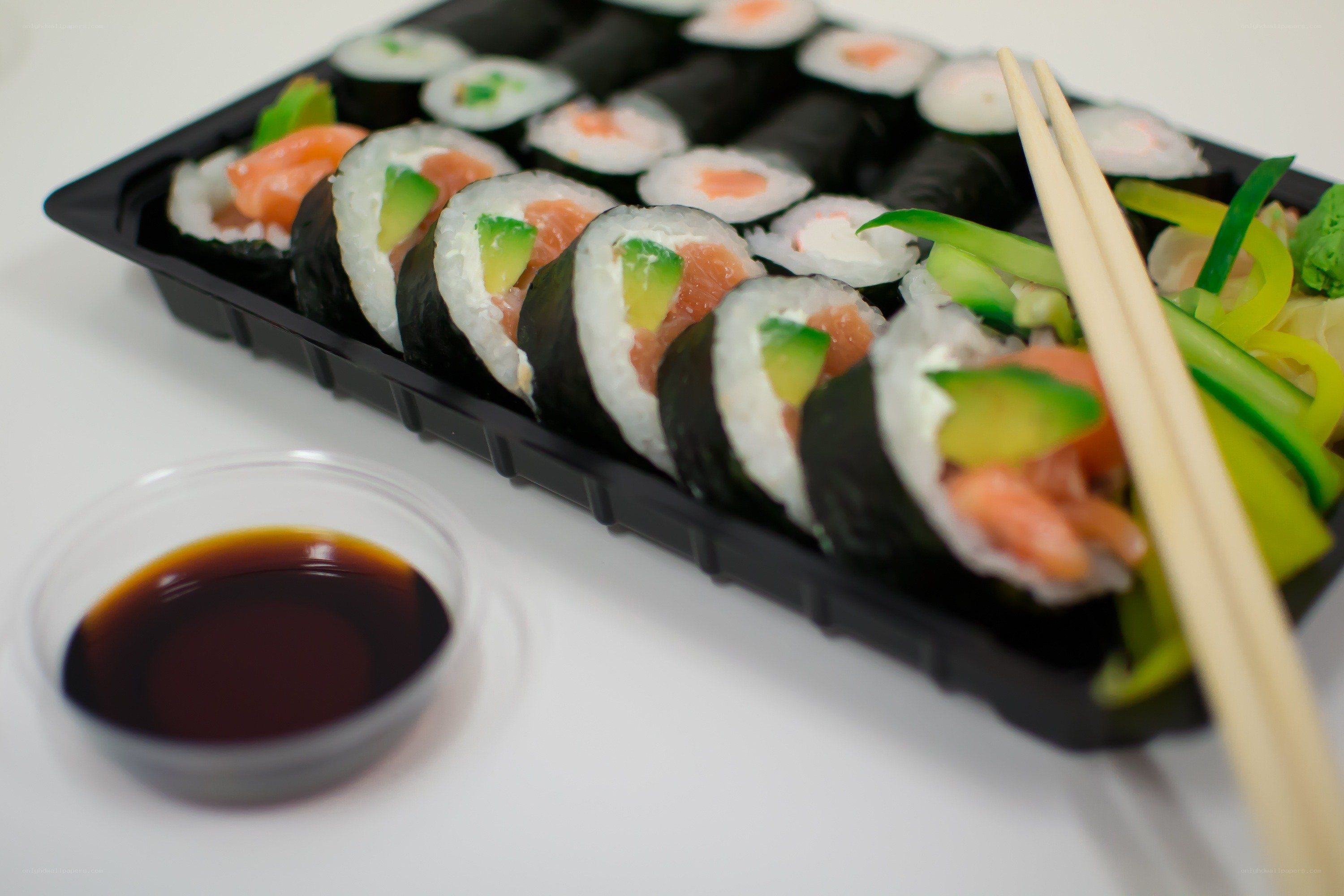 sushi rolls with soy sauce