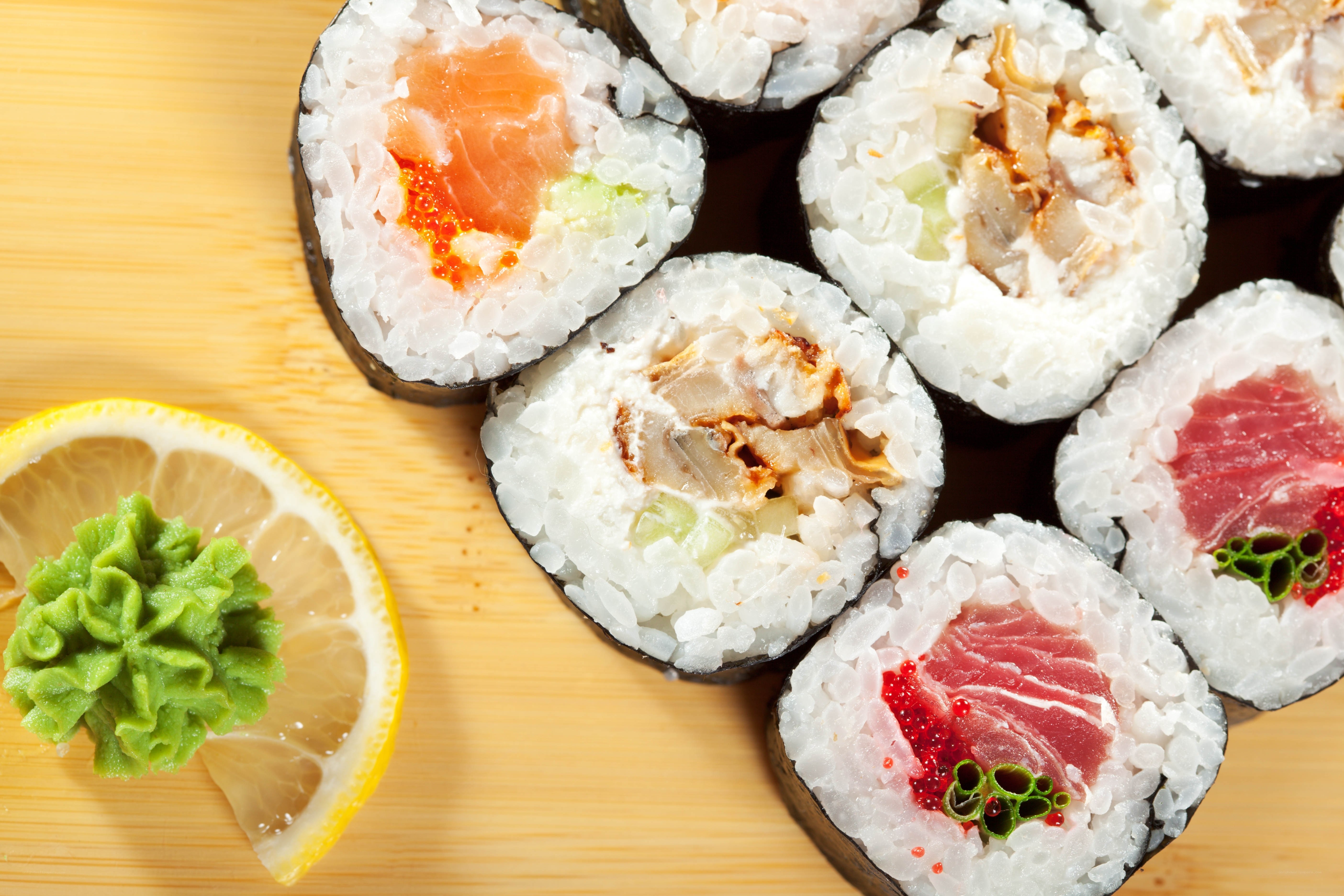 sushi rolls with wasabi and lemon