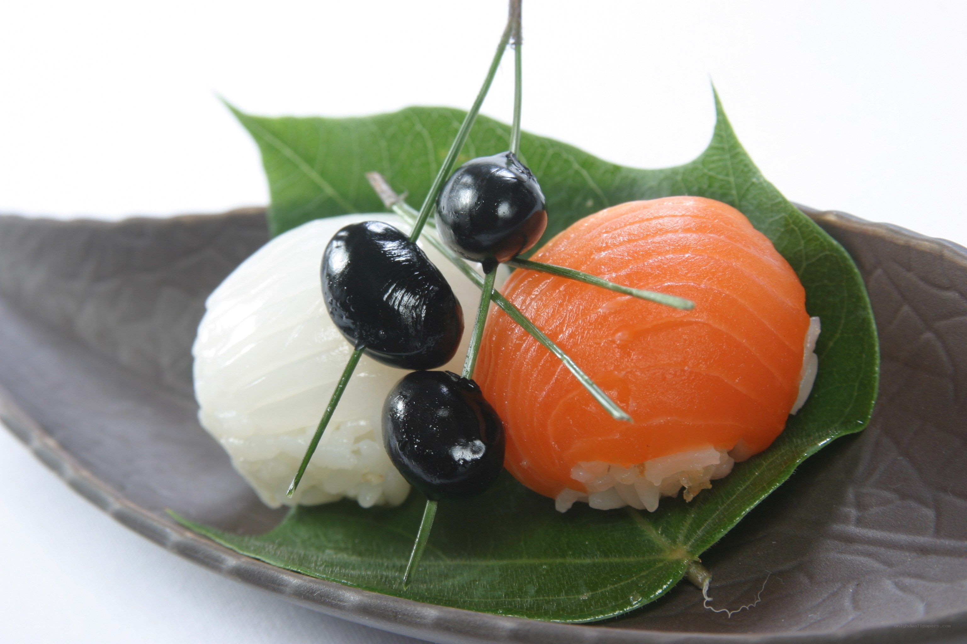 sushi with black cherries