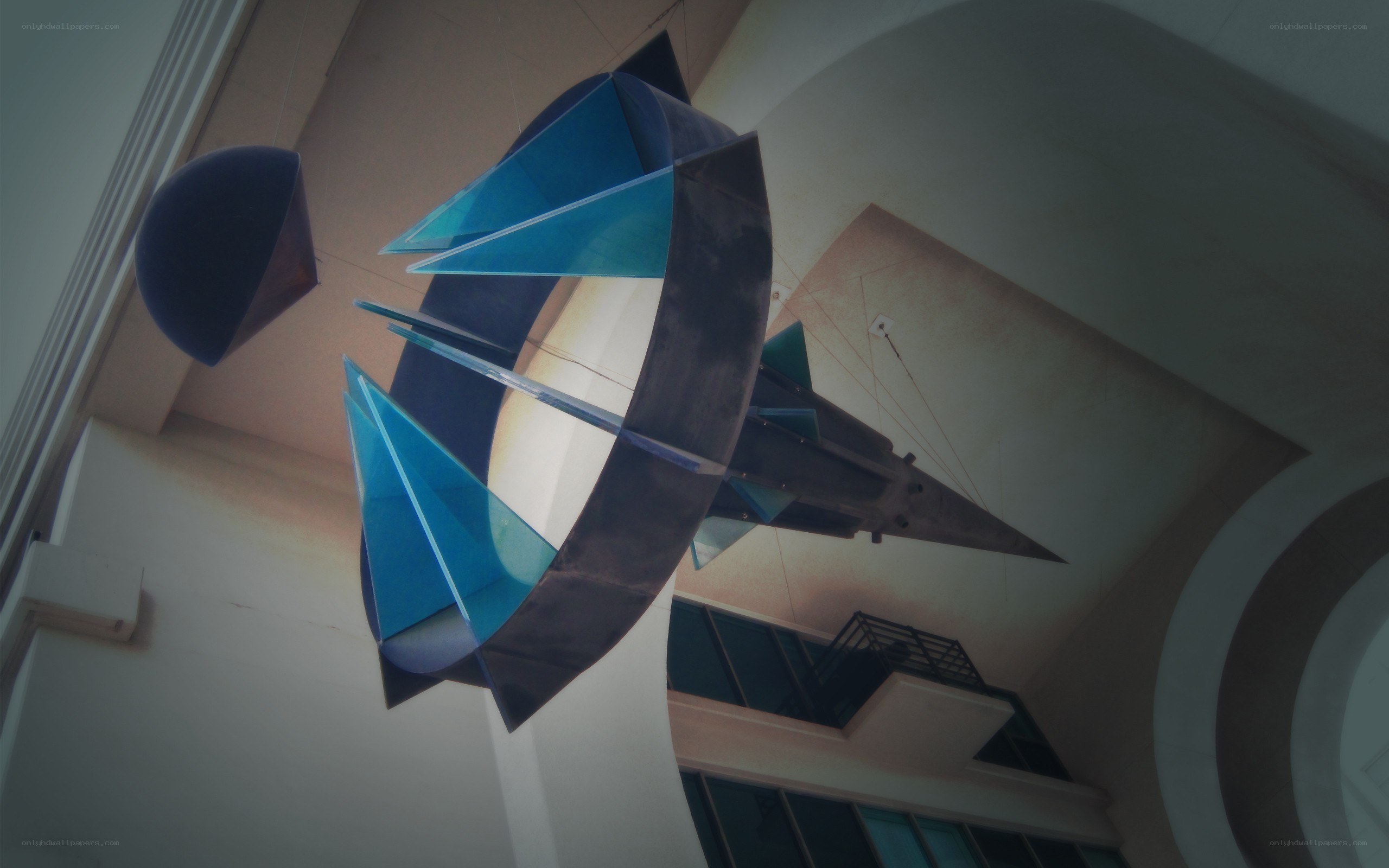 Suspended blue sculpture in atrium