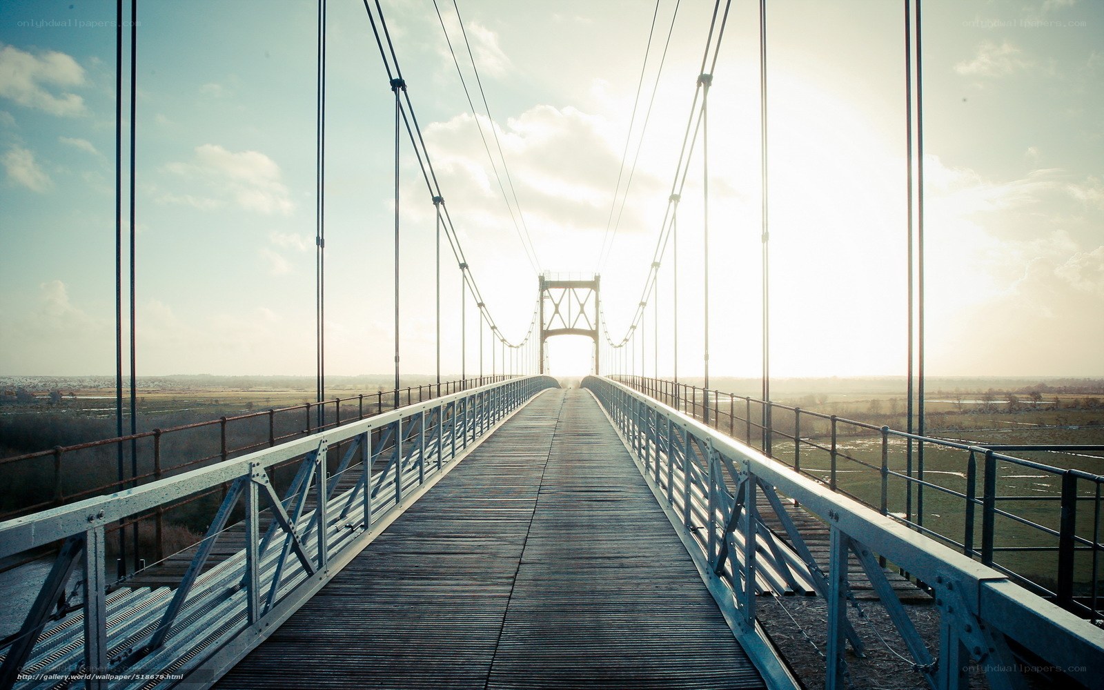 suspended bridge at sunset