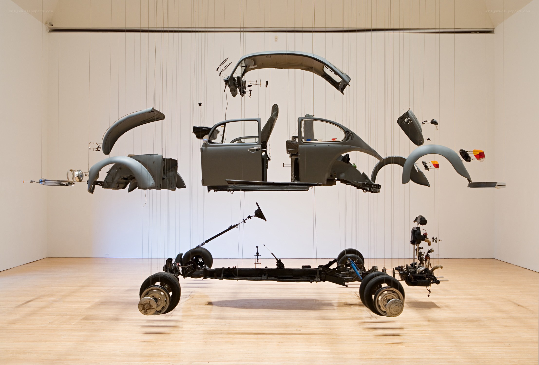 Suspended car disassembly art