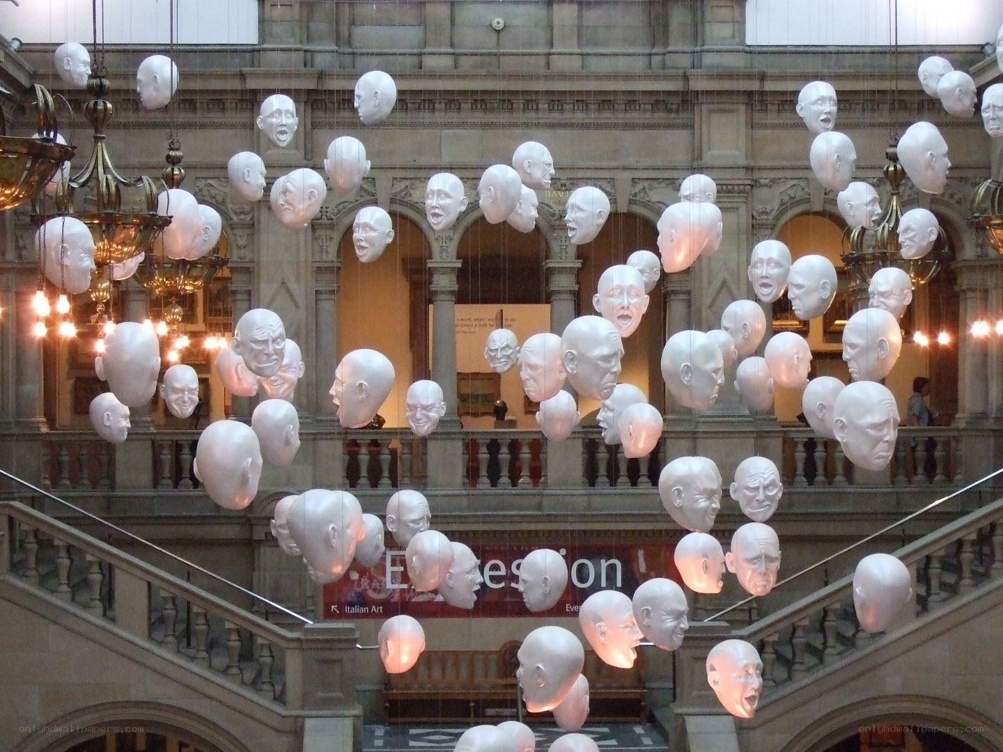 Suspended heads art installation