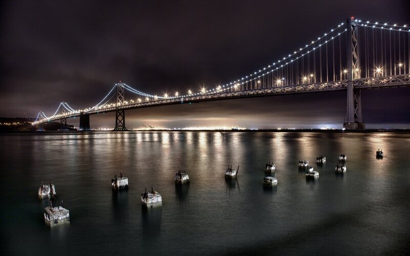 Suspension Bridge at Night — Black, Dramatic, Photograph, Water