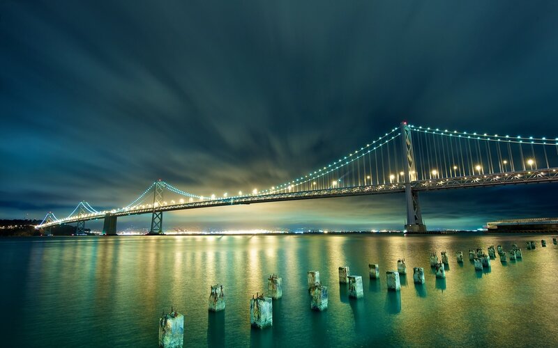 Suspension Bridge at Night — Blue, Dramatic, Photograph, Water, City Lights