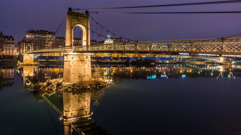 Suspension Bridge at Night — Blue, Serene, Photograph, River, Buildings