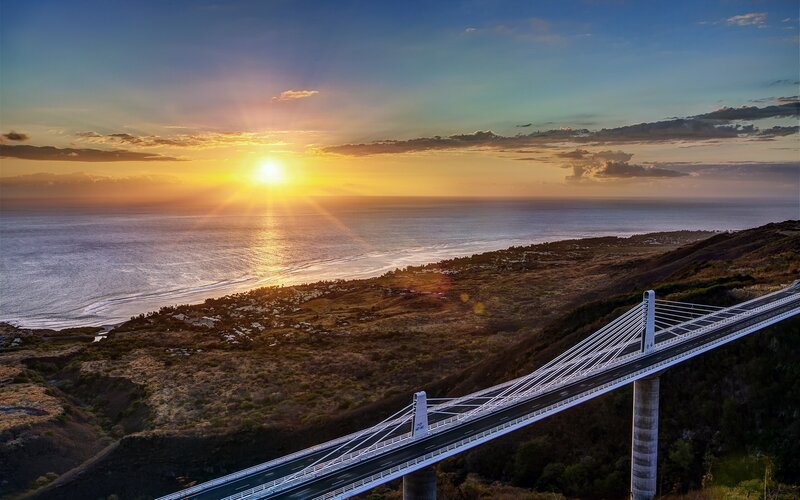 Suspension Bridge at Sunset — Blue, Serene, Photograph, Ocean