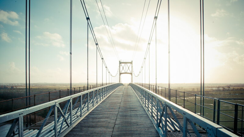 Suspension Bridge at Sunset — Blue, Serene, Photograph