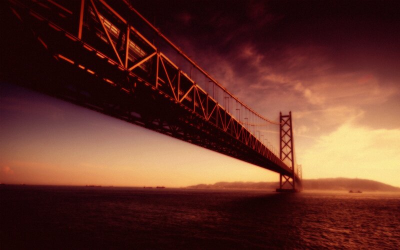 Suspension Bridge at Sunset — Orange, Dramatic, Photograph, Sea