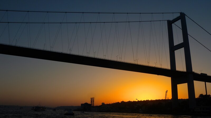 Suspension Bridge at Sunset — Orange, Dramatic, Photograph, Sky, Water