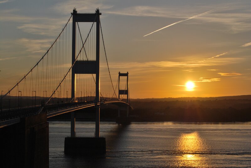 Suspension Bridge at Sunset — Orange, Serene, Photograph