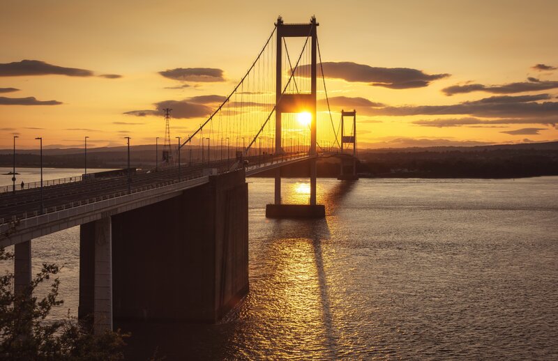 Suspension Bridge at Sunset — Orange, Serene
