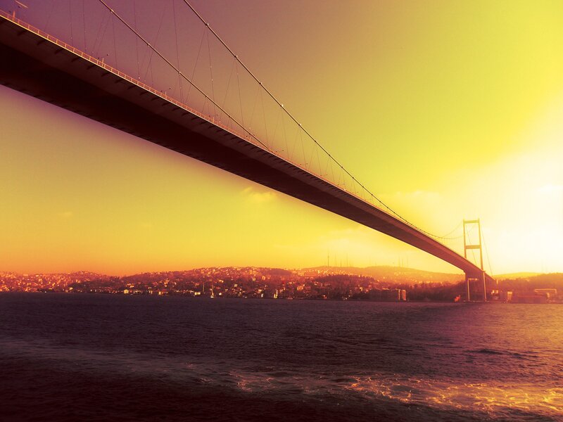 Suspension Bridge at Sunset — Yellow, Dramatic