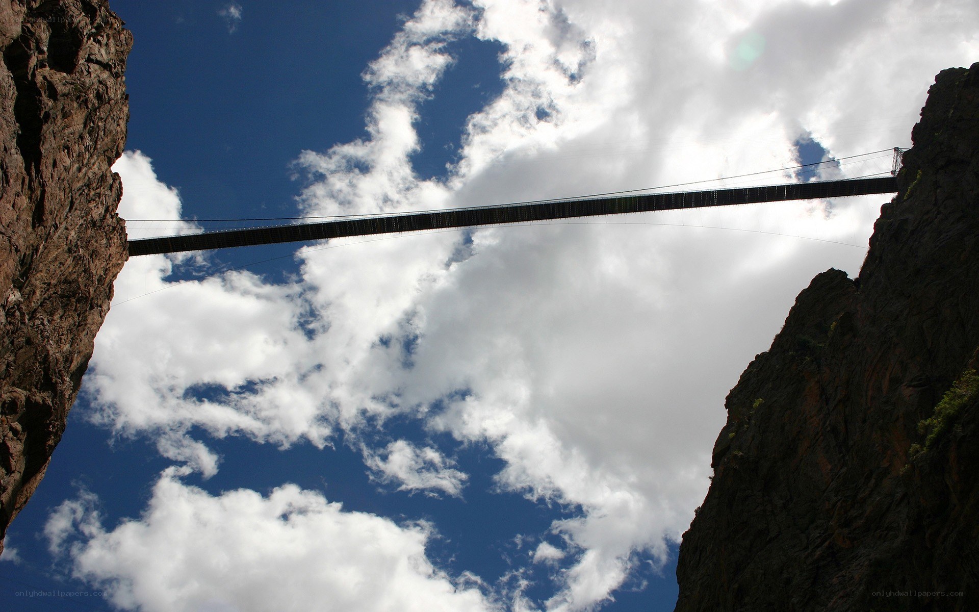 Suspension bridge between cliffs