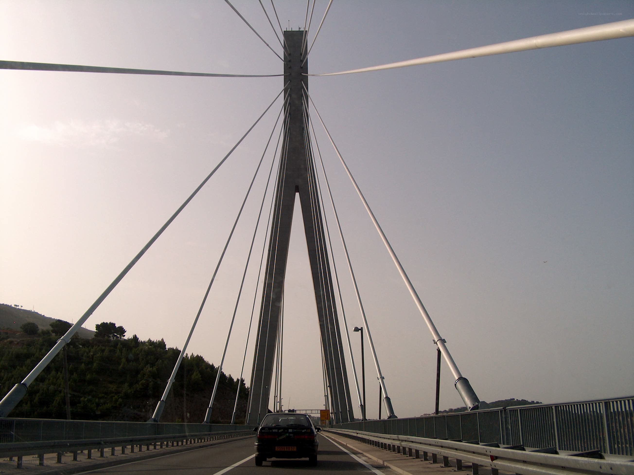suspension bridge from car view