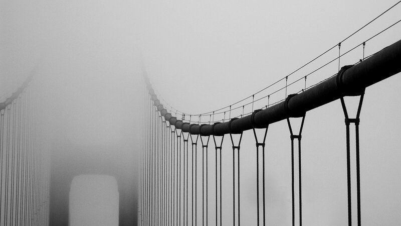 Suspension Bridge in Fog — Black, Misty