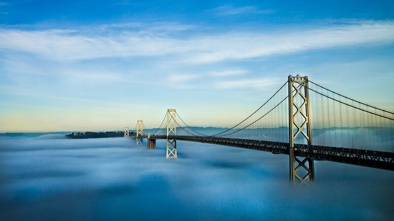 Suspension Bridge in Fog — Blue