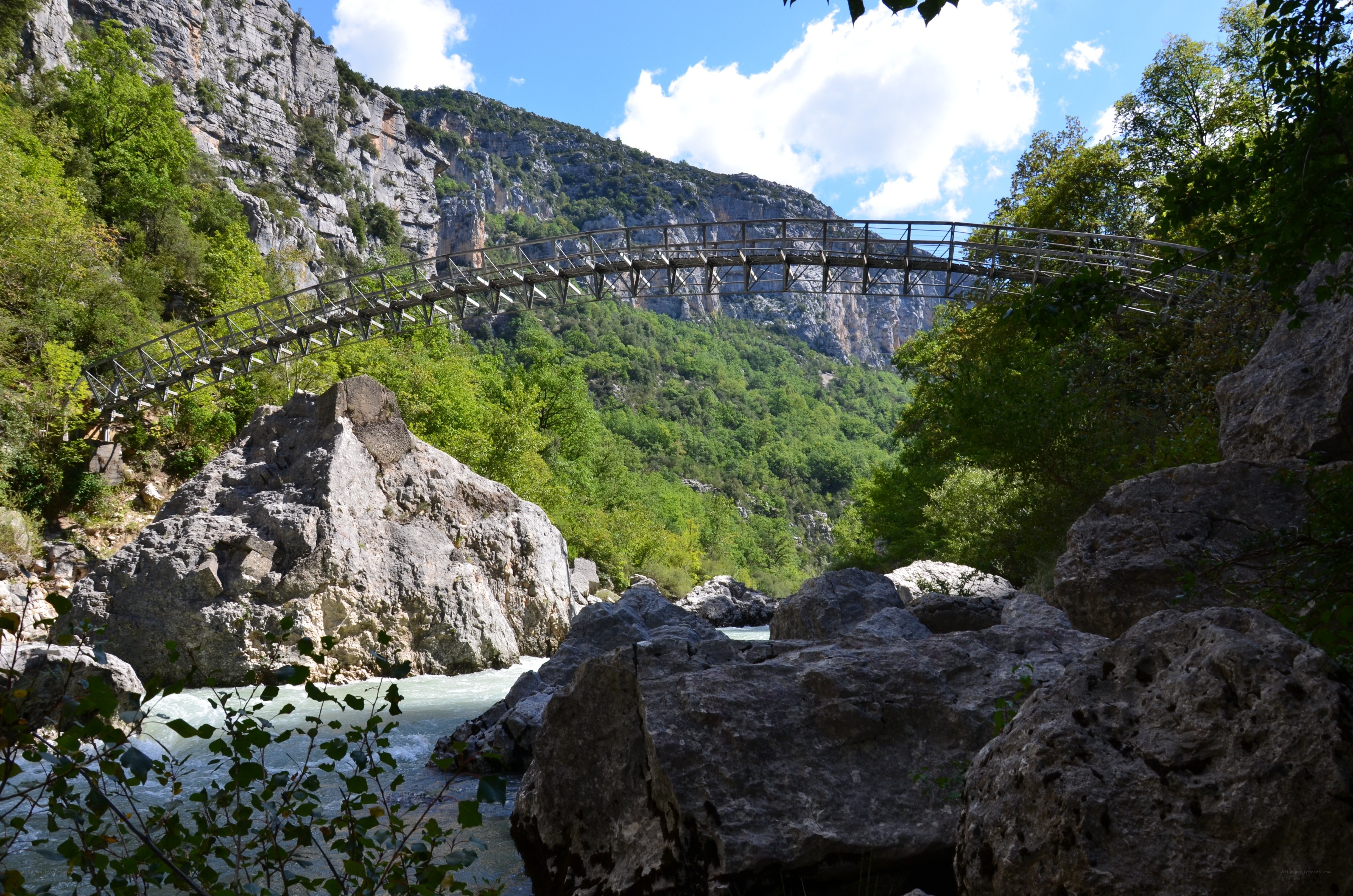 Suspension bridge over a river canyon