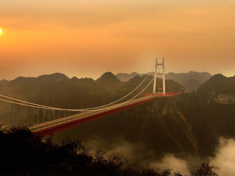 Suspension Bridge over Canyon — Orange