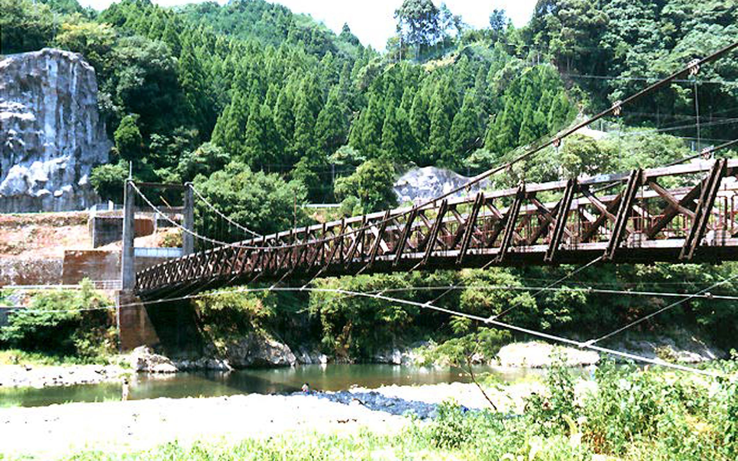 suspension bridge over river