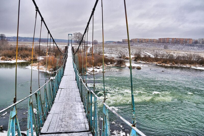 Suspension Bridge over River — Blue, Dreary