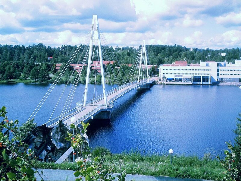 Suspension Bridge over River — Blue, Serene, Afternoon