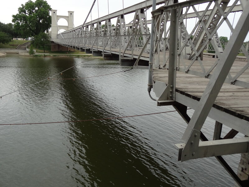 Suspension Bridge over River — Gray, Calm