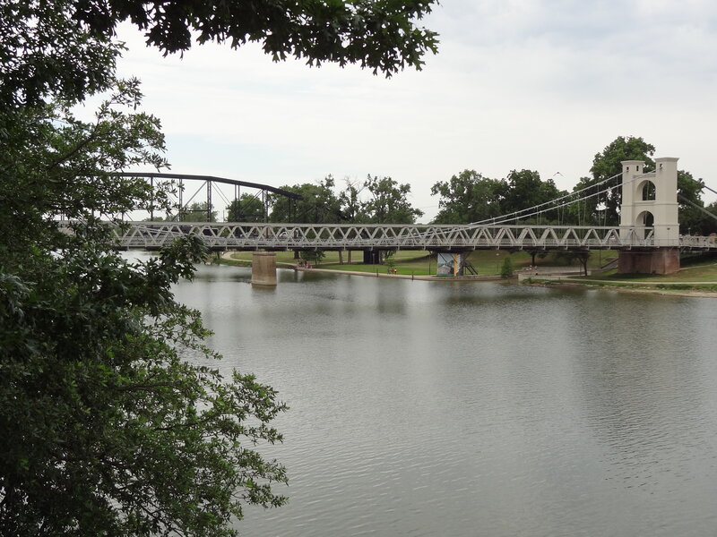 Suspension Bridge over River — Green, Calm