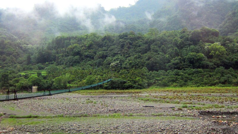 Suspension Bridge over River — Green, Misty