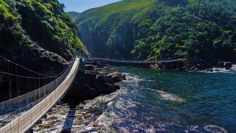 Suspension Bridge over River — Green, Serene, Afternoon, Photograph, Mountain