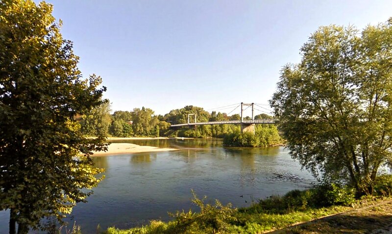 Suspension Bridge over River — Green, Serene, Afternoon