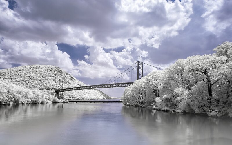 Suspension Bridge over River — White, Dramatic, Photograph