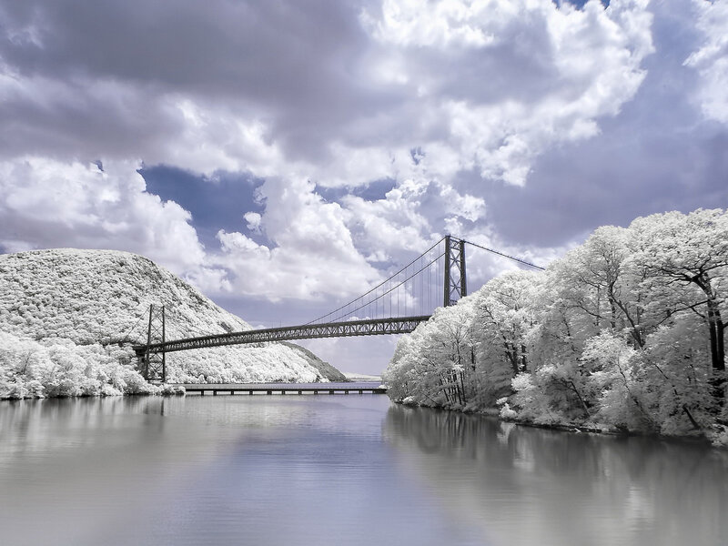 Suspension Bridge over River — White