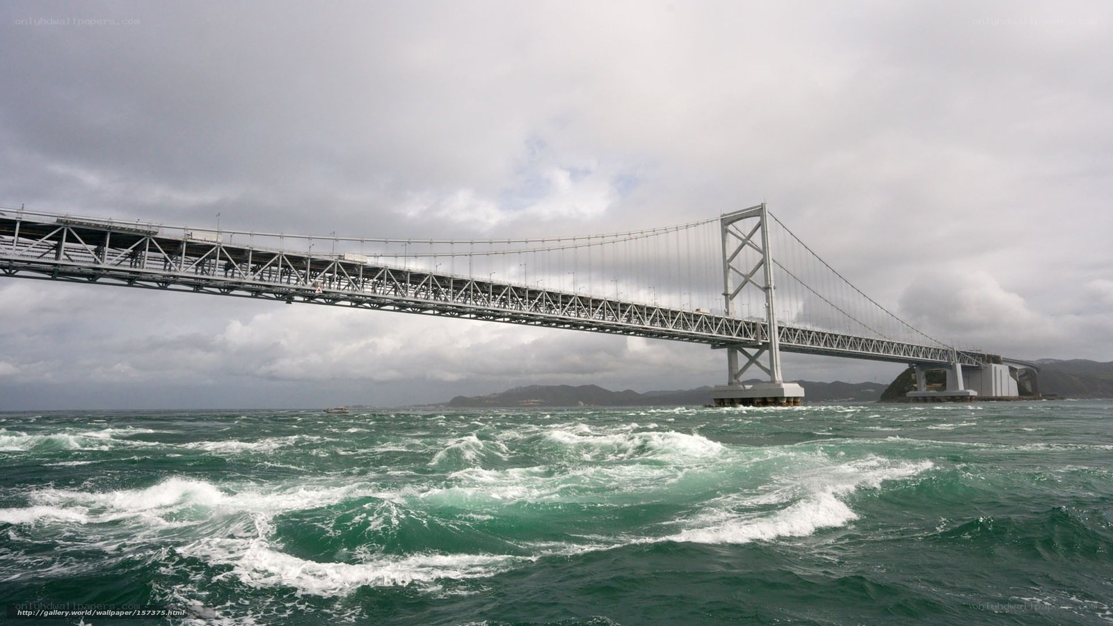 Suspension bridge over turbulent sea