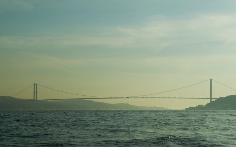 Suspension Bridge over Water — Blue, Calm, Afternoon, Photograph, Hills