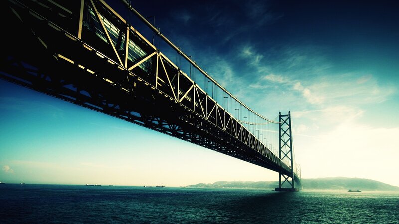 Suspension Bridge over Water — Blue, Dramatic, Afternoon, Photograph