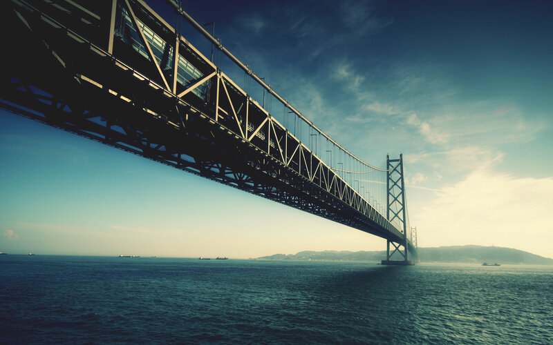 Suspension Bridge over Water — Blue, Dramatic, Afternoon