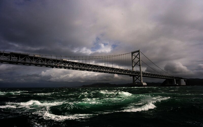 Suspension Bridge over Water — Gray, Dramatic, Photograph, Ocean, Clouds