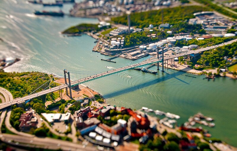Suspension Bridge over Water — Green, Serene, Afternoon, Photograph