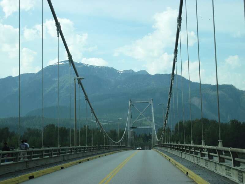 Suspension Bridge with Mountains