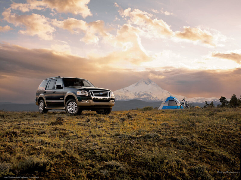 SUV camping with mountain view