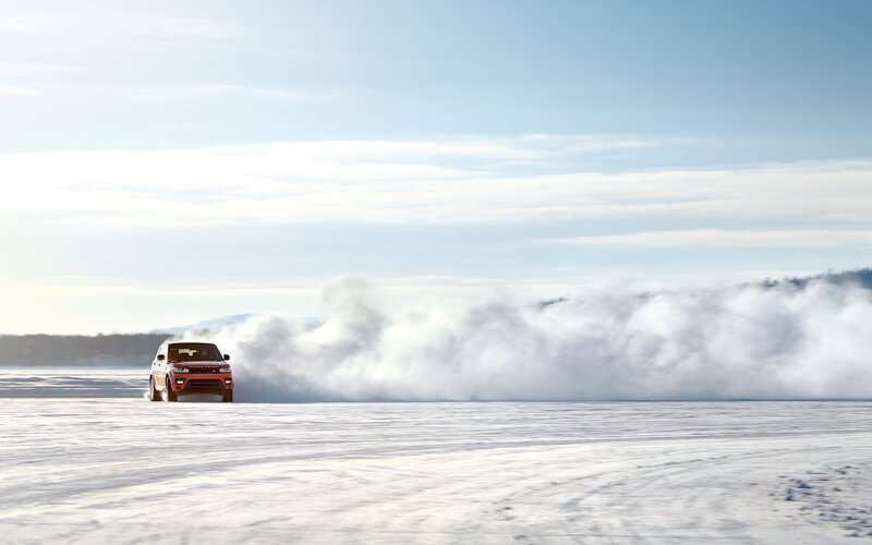 SUV drifting on frozen lake