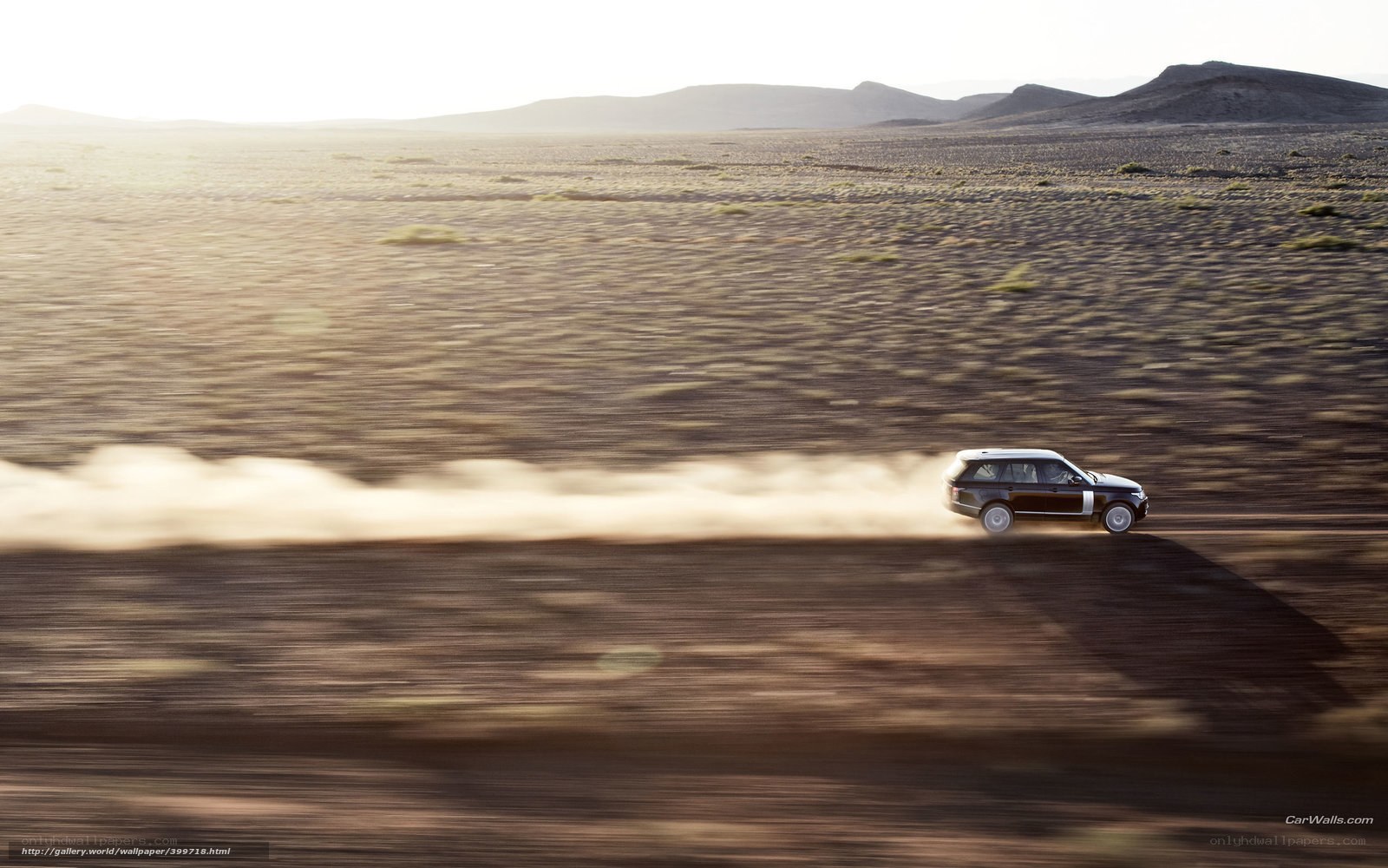 SUV driving in desert
