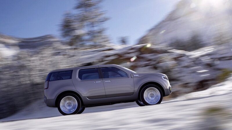 SUV driving on snowy road